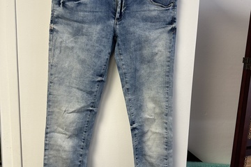 Afbeelding van lichtblauwe skinny jeans van Tally Weijl in maat 38. De jean