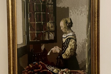 Afbeelding van Naaldkunst naar schildrij van  Vermeer, Lezende vrouw Art Gallery Amsterdam