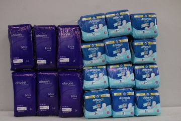 Afbeelding van 6 pakken Absorin en 12 pakken Attens soft.