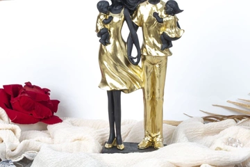 Afbeelding van Echtpaar met 2 kinderen staand goud/zwart h=29,5cm (nieuwe)