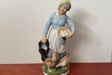 Afbeelding van Boerin met mand eieren