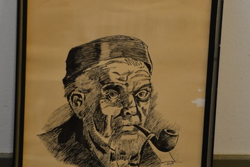 Afbeelding van Ingelijste pentekening of ets van een man met pijp.