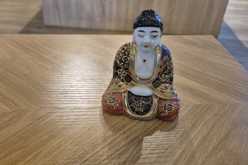 Afbeelding van boeddha beeldje