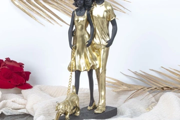 Afbeelding van Echtpaar met hond  goud/zwart h=29,5cm (nieuwe)