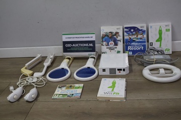 Afbeelding van Nintendo Wii met diverse sport accessoires en spellen