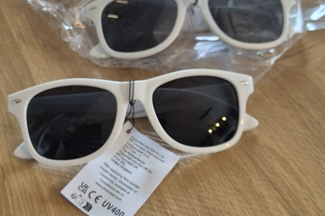 Afbeelding van Zonnebrillen 25 stuks wit