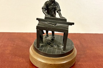 Afbeelding van Tinnen beeld van een timmerman