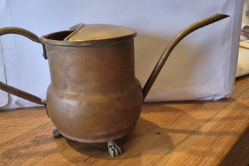 Afbeelding van rood koperen watergieter