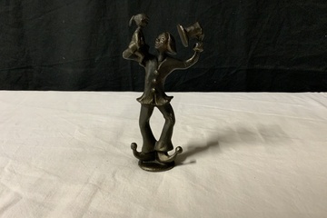 Afbeelding van Bronzen Clown met Kind van Corry Ammerlaan