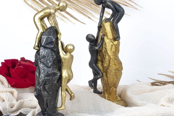 Afbeelding van 2 beelden treken elkaar op de rots goud/zwart (nieuwe)