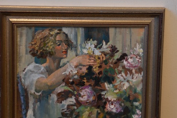 Afbeelding van Ingelijst olieverfschilderij: Vrouw schikt boeket, Levy '01