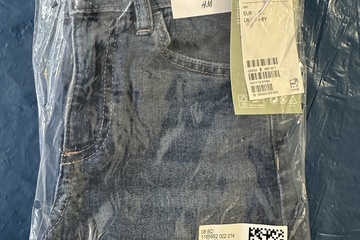 Afbeelding van H&M Relaxed Fit jeans voor kinderen in maat 128 (7–8 jaar).