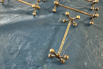 Afbeelding van Set van 6 vintage metalen onderzetters in messing/bronskleur