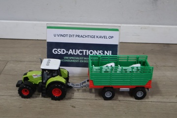 Afbeelding van Tractor met aanhangwagen en 2 koeien